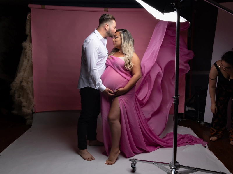 Editorial maternity portrait with sculpted gown lines and subtly enhanced silhouette 1.jpg