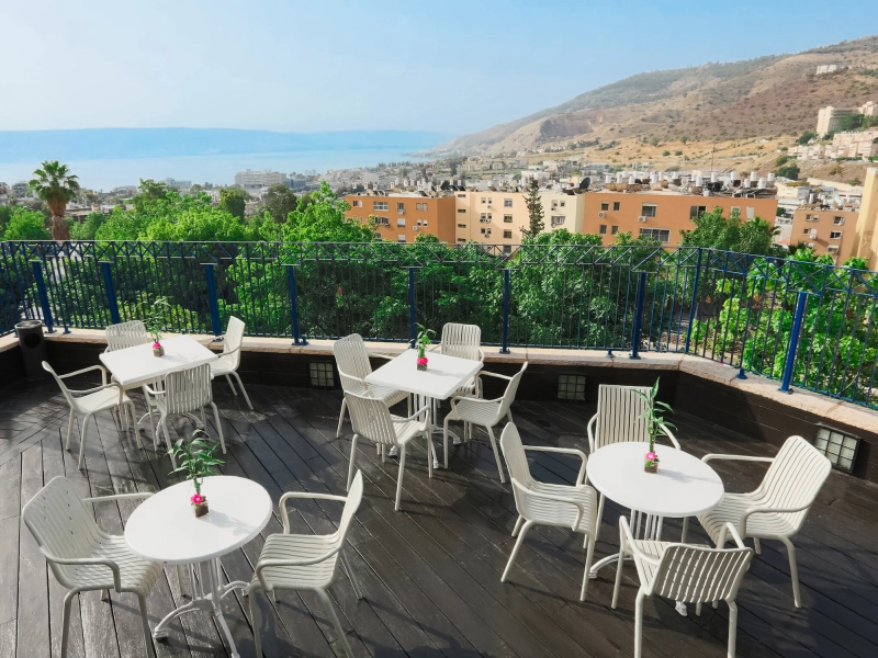 After real estate photo editing of rooftop café with enhanced color vibrancy, balanced white tones, cleaned dining space, removed terrace distractions, and polished commercial presentation.jpg After real estate photo editing of rooftop café with enhanced color vibrancy, balanced white tones, cleaned dining space, removed terrace distractions, and polished commercial presentation.jpg