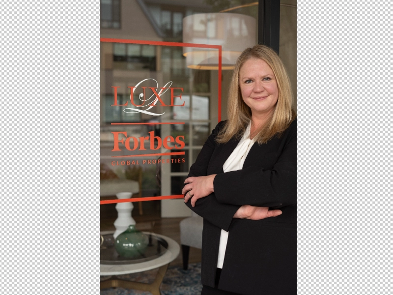 Unedited portrait of property agent in front of office with slight color imbalance, shadow inconsistencies, and reflective glass background.jpg Unedited portrait of property agent in front of office with slight color imbalance, shadow inconsistencies, and reflective glass background.jpg