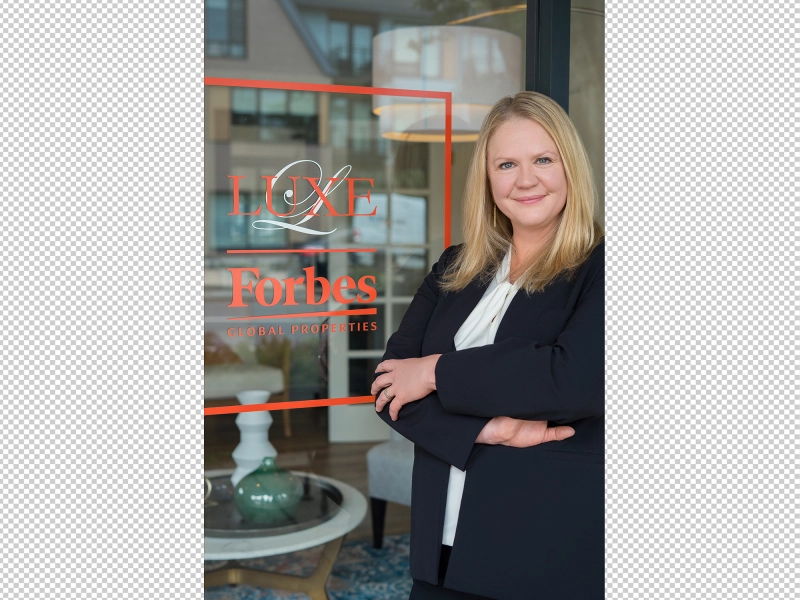 Professionally edited real estate agent portrait with refined exposure, even skin tones, minimized reflections, enhanced clarity, and consistent styling aligned with team branding.jpg Professionally edited real estate agent portrait with refined exposure, even skin tones, minimized reflections, enhanced clarity, and consistent styling aligned with team branding.jpg