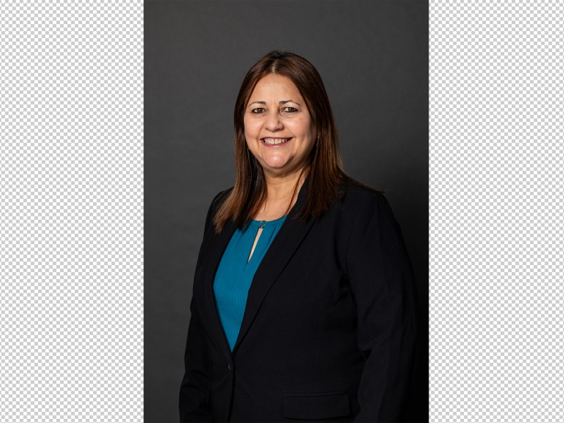 Unedited business portrait of female employee with slight shadows, natural skin texture variations, and unrefined background tone.jpg Unedited business portrait of female employee with slight shadows, natural skin texture variations, and unrefined background tone.jpg