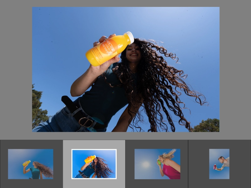 Before batch editing lifestyle photo of nectar beverage bottle shot in harsh sunlight with uneven lighting, dull colors, reflections, and background distractions.jpg Before batch editing lifestyle photo of nectar beverage bottle shot in harsh sunlight with uneven lighting, dull colors, reflections, and background distractions.jpg